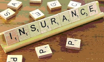 Scrabble rack with "Insurance" plus 3 "P" tiles